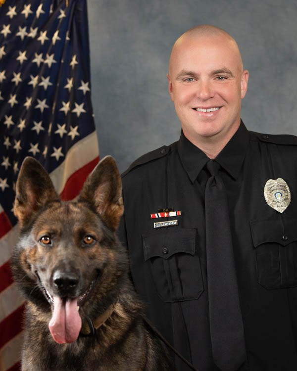Photo of Officer Wemlinger and K9 Knox