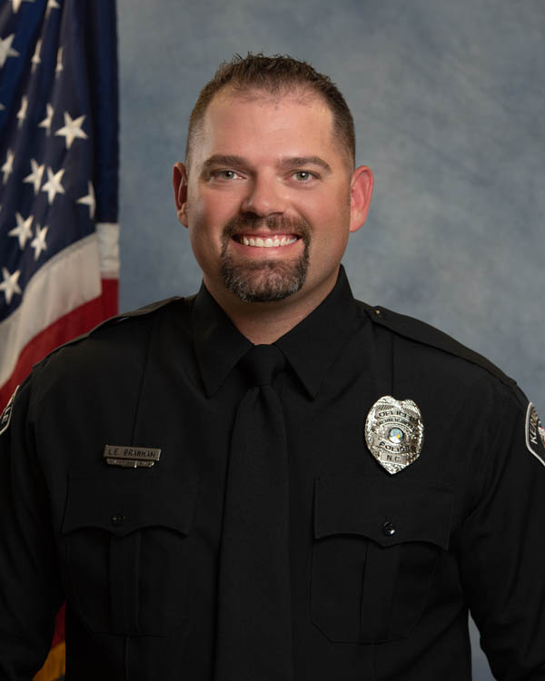 Photo of Officer Branham and K9 Snitch